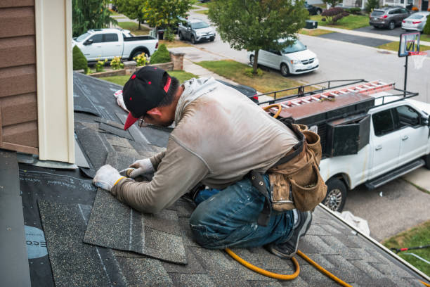 Professional Roofing technician working in Hull, IA